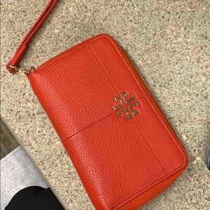 Pristine condition bright red Tory Burch wallet.